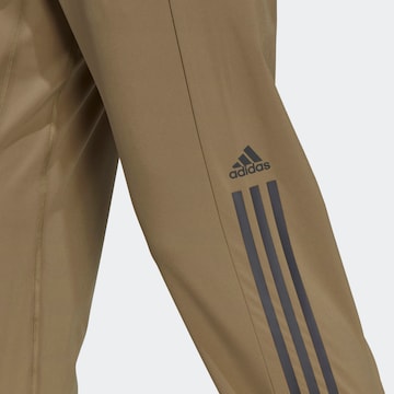 Regular Pantalon de sport 'Alphastrength Zip' ADIDAS SPORTSWEAR en vert