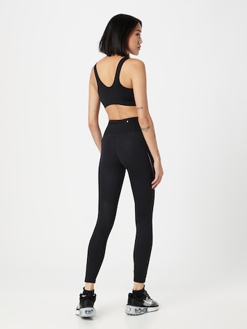 NIKE Skinny Sporthose in Schwarz