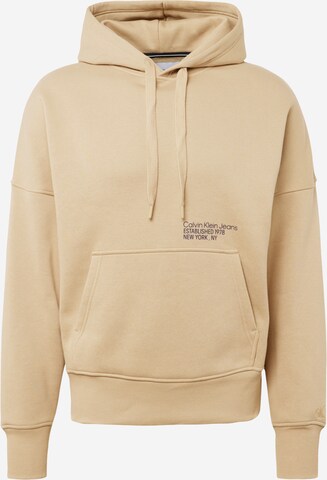 Sweat-shirt Calvin Klein Jeans en beige : devant