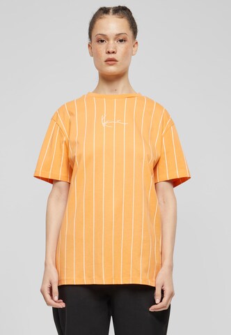 T-shirt Karl Kani en orange : devant