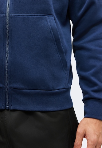 Veste de survêtement 'EVOLUTION SIMPLE DOME' THE NORTH FACE en bleu
