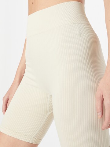 Skinny Pantaloni 'Cycling' di NU-IN in beige