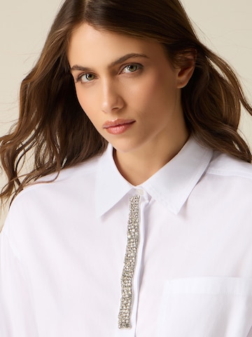 Maglietta di oltre in bianco