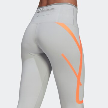 Skinny Pantalon de sport ADIDAS BY STELLA MCCARTNEY en gris