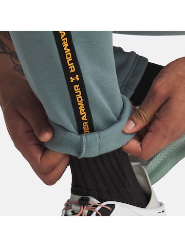 UNDER ARMOUR Slim fit Pants in Blue