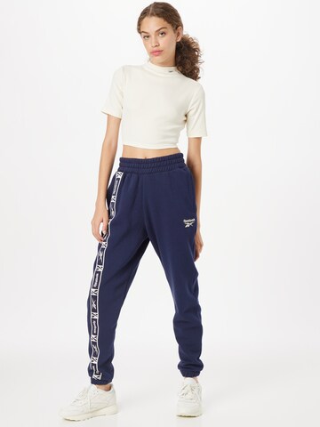 Effilé Pantalon de sport Reebok en bleu