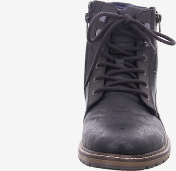 Boots stringati '13742' di Rieker in nero