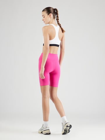 UNDER ARMOUR Skinny Sportovní kalhoty 'Motion' – pink