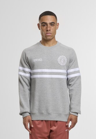 Unfair Athletics Sweatshirt 'DMWU' in Grijs