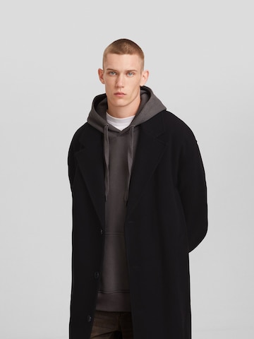 Manteau mi-saison Bershka en noir : devant