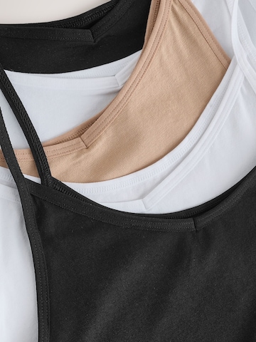 Haut Next en mélange de couleurs