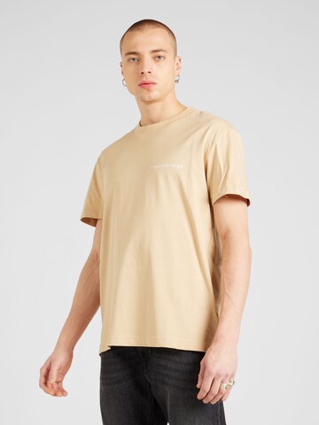 Calvin Klein Jeans T-shirt 'INSTITUTIONAL' i beige: framsida