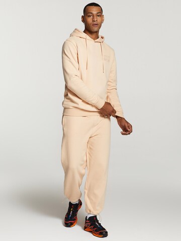 Shiwi Tapered Broek in Oranje