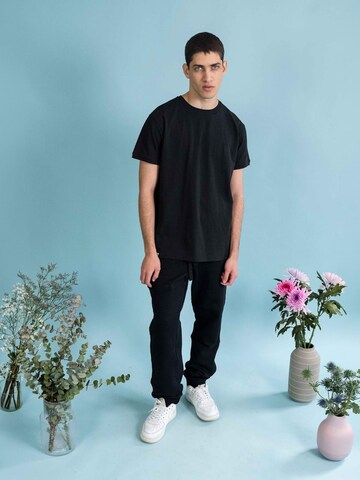 NOORLYS Regular Workout Pants 'STIEFBUCK' in Black: front