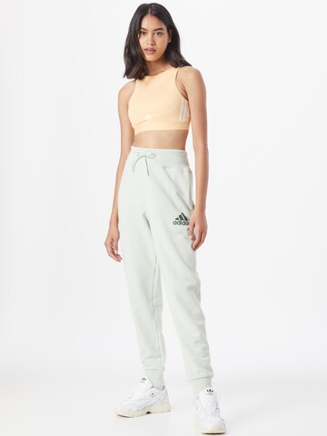 ADIDAS SPORTSWEAR Tapered Workout Pants 'Essentials Multi-Colored Logo' in Green