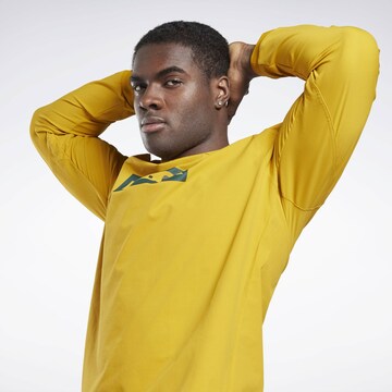 Reebok - Camisa funcionais em amarelo