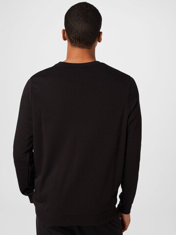 PUMA Athletic Sweatshirt 'Ess' in Black