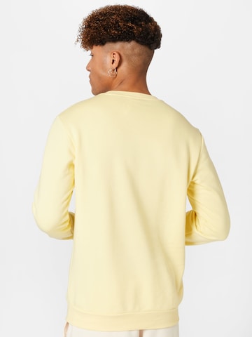 ADIDAS SPORTSWEAR Sport sweatshirt 'Essentials Fleece' i gul
