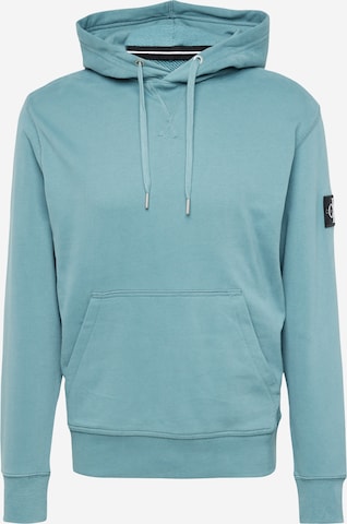 Sweat-shirt Calvin Klein Jeans en bleu : devant