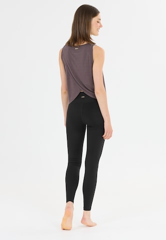Athlecia Skinny Sports trousers 'Bloom' in Black