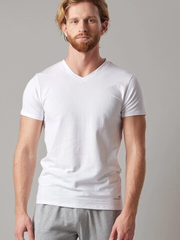 Chemise folklorique 'T-Shirt Scollo a V Elasticizzata Blu e Bianco - Set da 2' OWN Off With Nature en bleu