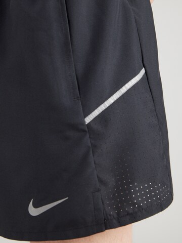 NIKE Normalny krój Spodnie sportowe 'MILER' w kolorze czarny