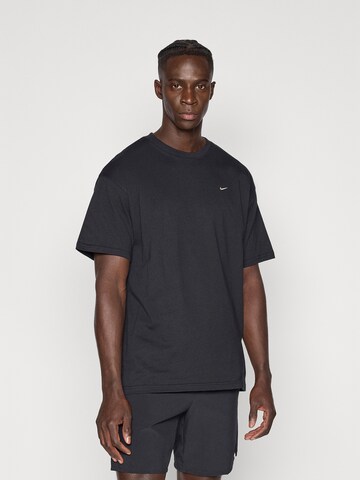 T-Shirt fonctionnel NIKE en noir