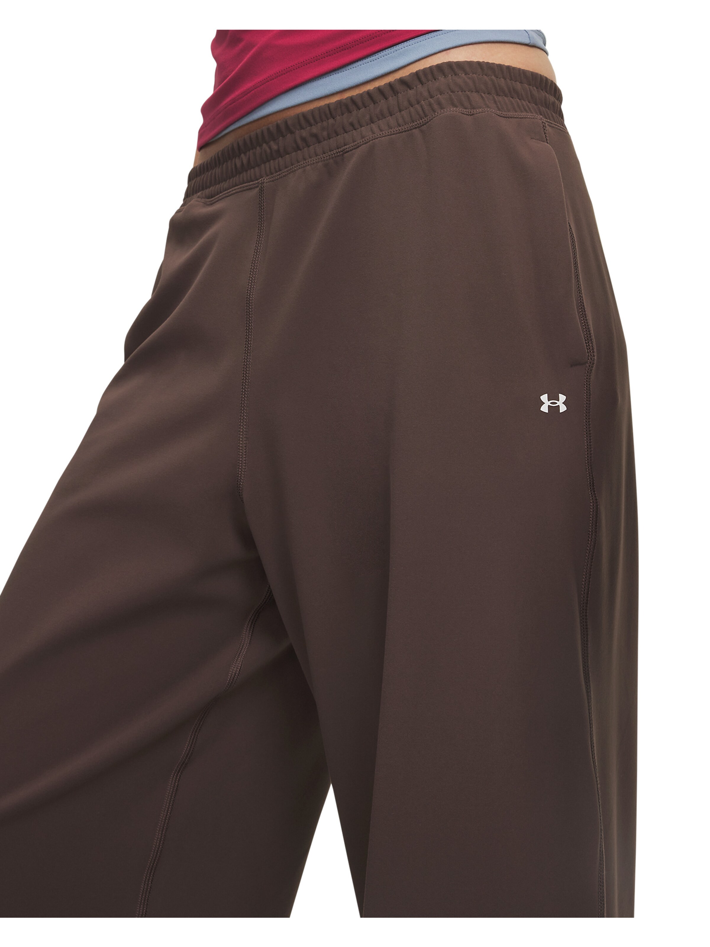 UNDER ARMOUR Wide leg Sportbroek 'Motion' in Bruin