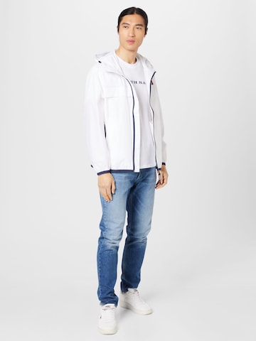 Tommy Jeans Prehodna jakna 'CHICAGO' | bela barva
