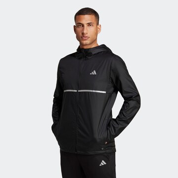 ADIDAS PERFORMANCE Urheilutakki 'Own The Run' värissä musta: edessä