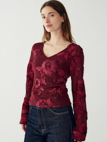 Top ' Lucille ' di Noella in rosso