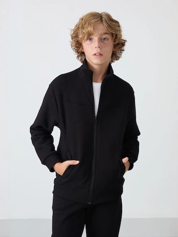 Tommy Life Trainingspak 'TOMMY Kinder Sport-Set' in Zwart