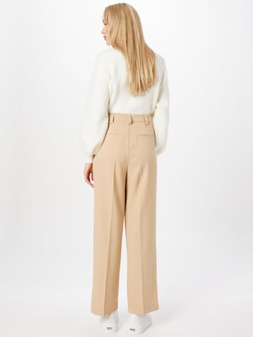 Gina Tricot Loose fit Pleated Pants in Beige