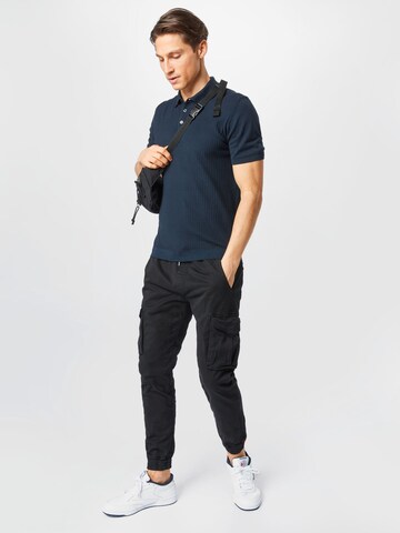 ALPHA INDUSTRIES Tapered Cargo Pants in Black