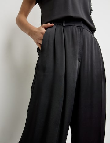TAIFUN Široke hlačnice Hlače | črna barva
