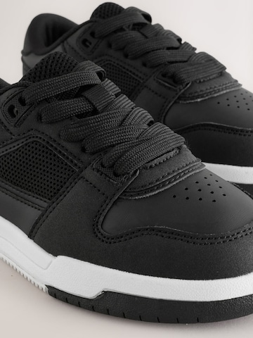 Baskets Next en noir