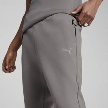 PUMA Slimfit Sporthose 'Evostripe' in Grau