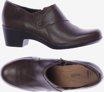 CLARKS Flats & Loafers in 43,5 in Brown: front