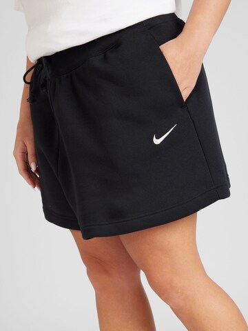 Nike Sportswear Loosefit Broek 'PHNX FLC' in Zwart