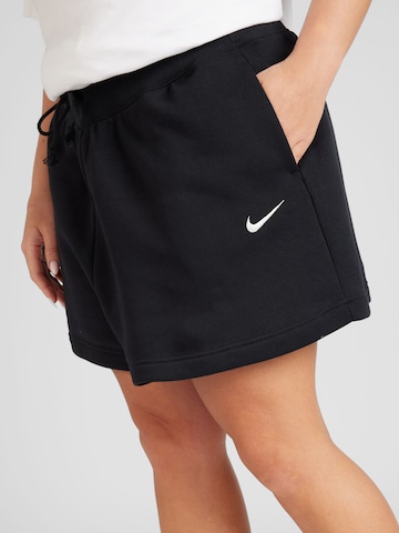 Nike Sportswear Loosefit Παντελόνι 'PHNX FLC' σε μαύρο