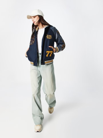 Superdry Φθινοπωρινό και ανοιξιάτικο μπουφάν σε μπλε
