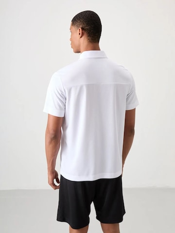 T-Shirt 'T-Shirts' Tommy Life en blanc