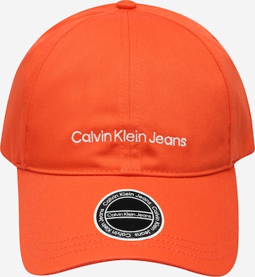 Calvin Klein Jeans Czapka z daszkiem w kolorze pomarańczowy: przód