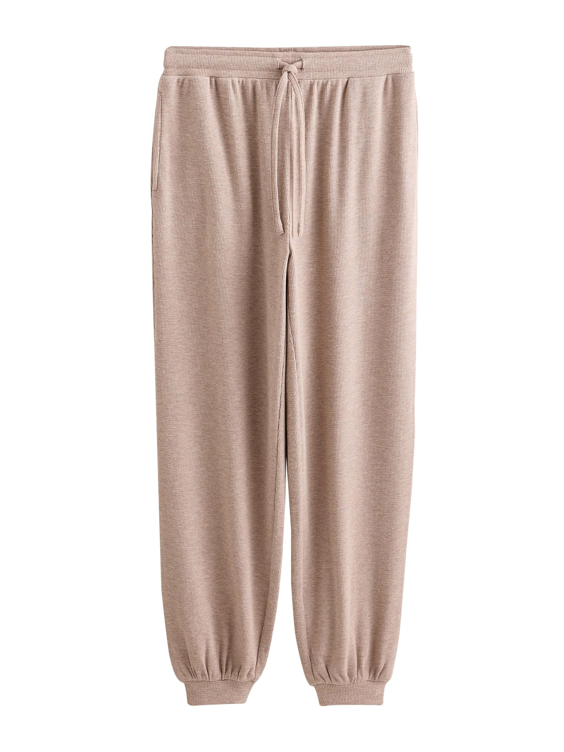 Pijama de la Next pe bej