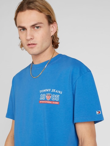 Tommy Jeans T-shirt 'ARCHIVE GAMES' i blå