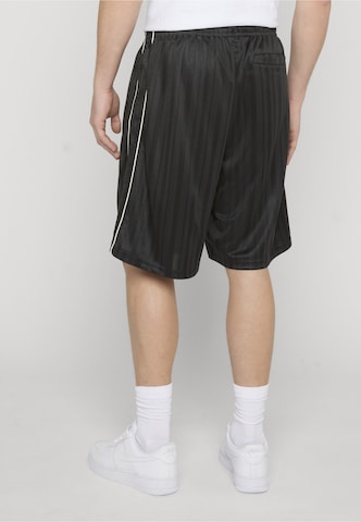 Loosefit Pantaloni di Karl Kani in nero
