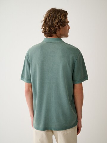 Tricou de la Next pe verde