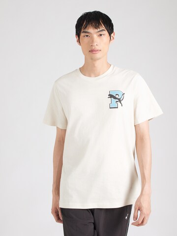 PUMA - Camisa funcionais 'Graphic Varsity' em branco: atrás