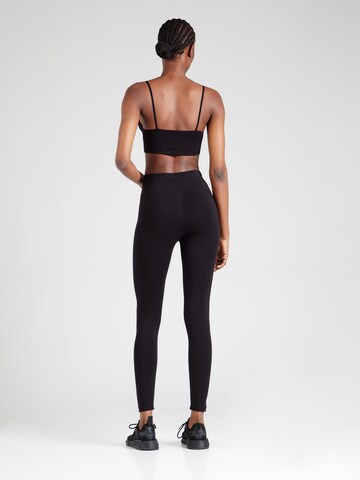 Champion Authentic Athletic Apparel Skinny Sporthose in Schwarz