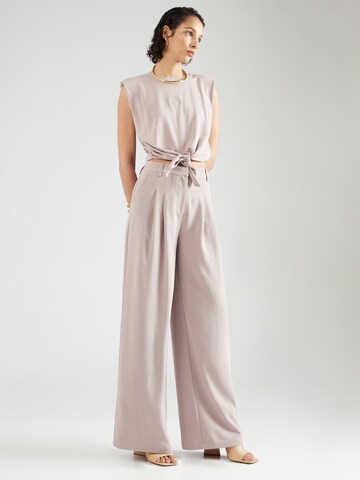 ABOUT YOU x Iconic by Tatiana Kucharova Loose fit Pleat-Front Pants 'Mathilda' in Beige